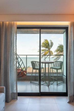 Loft pé na areia frente mar com vista incrível